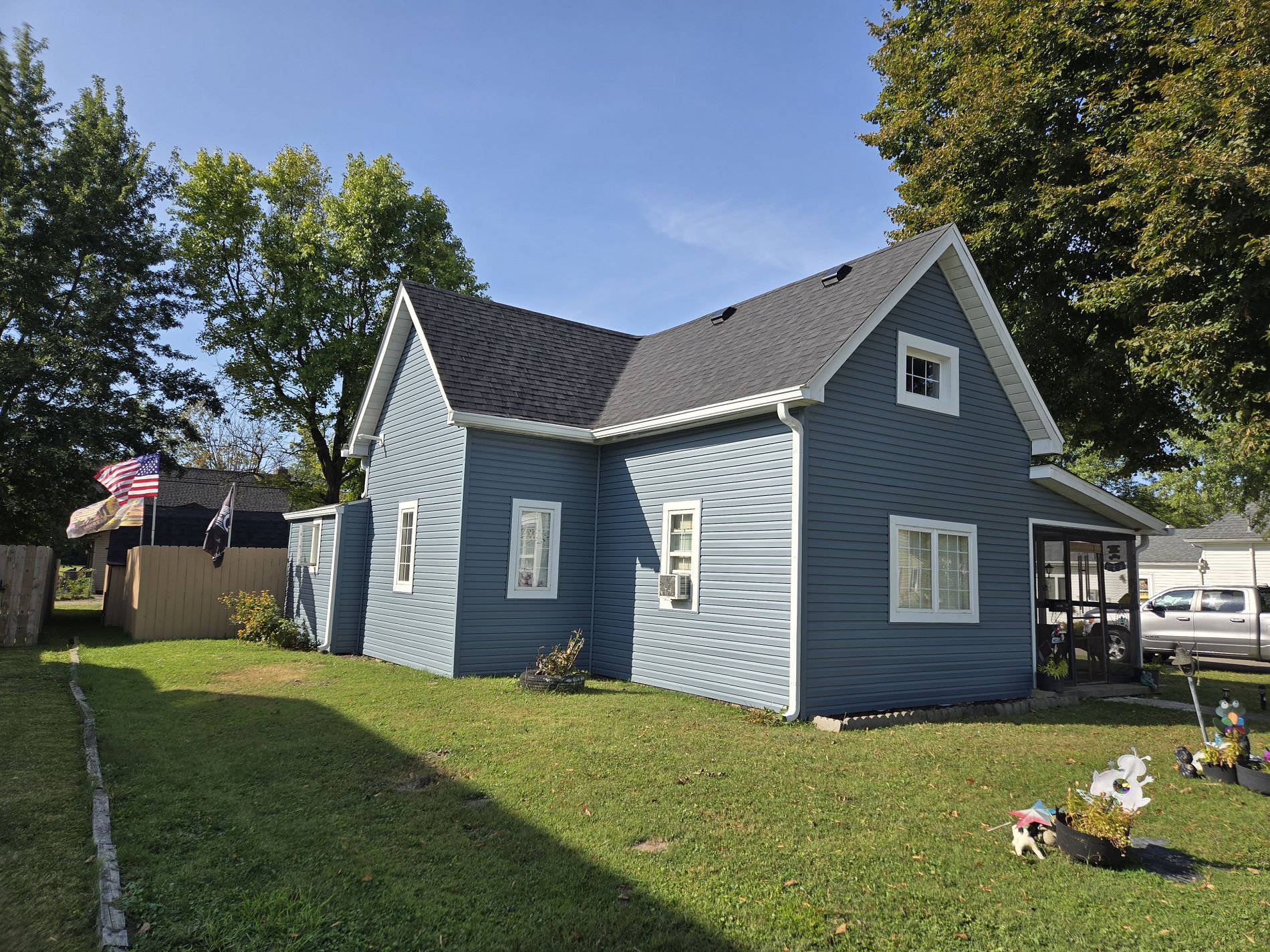 slate blue vinyl siding installation with white trim by white river exteriors in carmel indiana